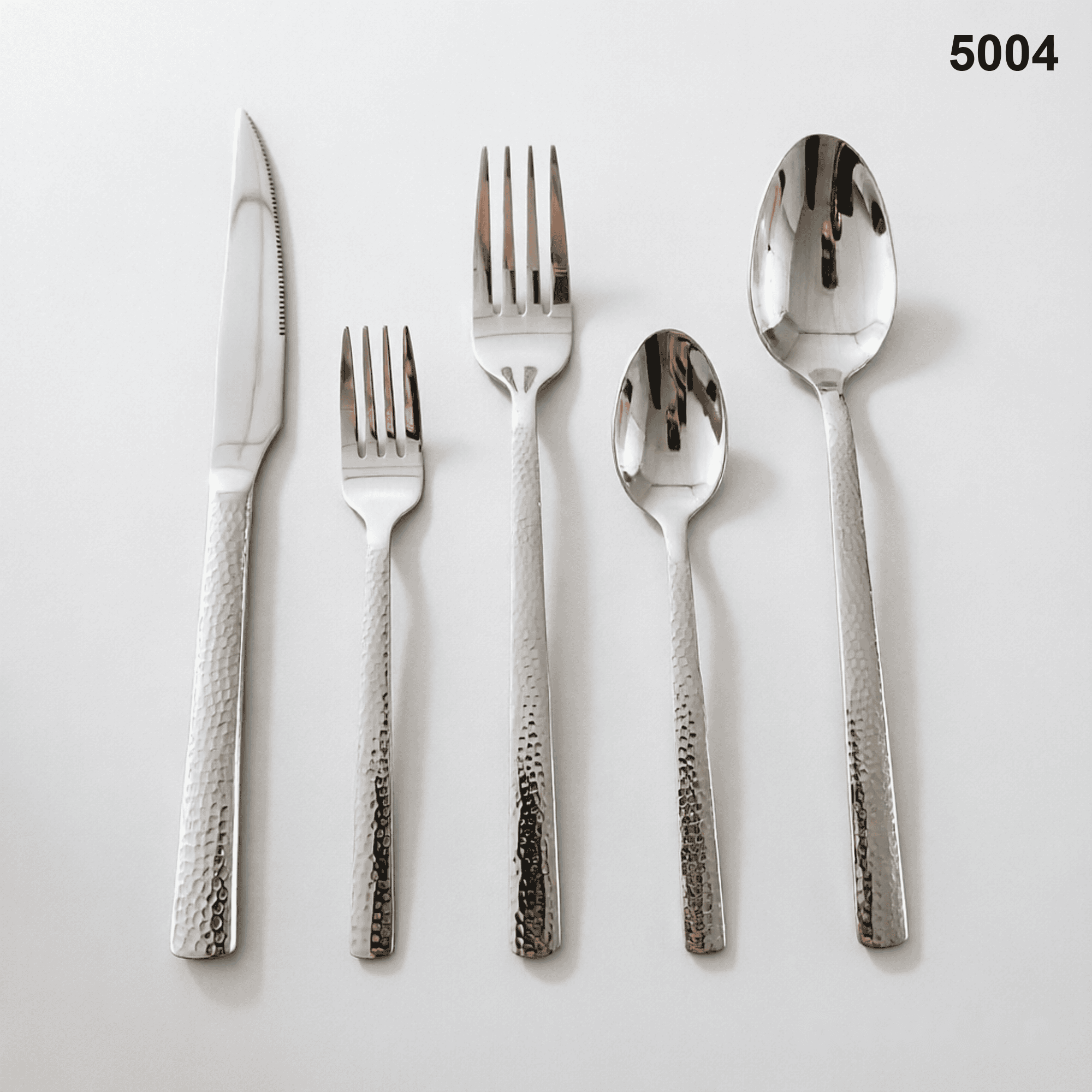 5004 pebble-like hammered dimples across gently tapered handles 20-piece flatware set