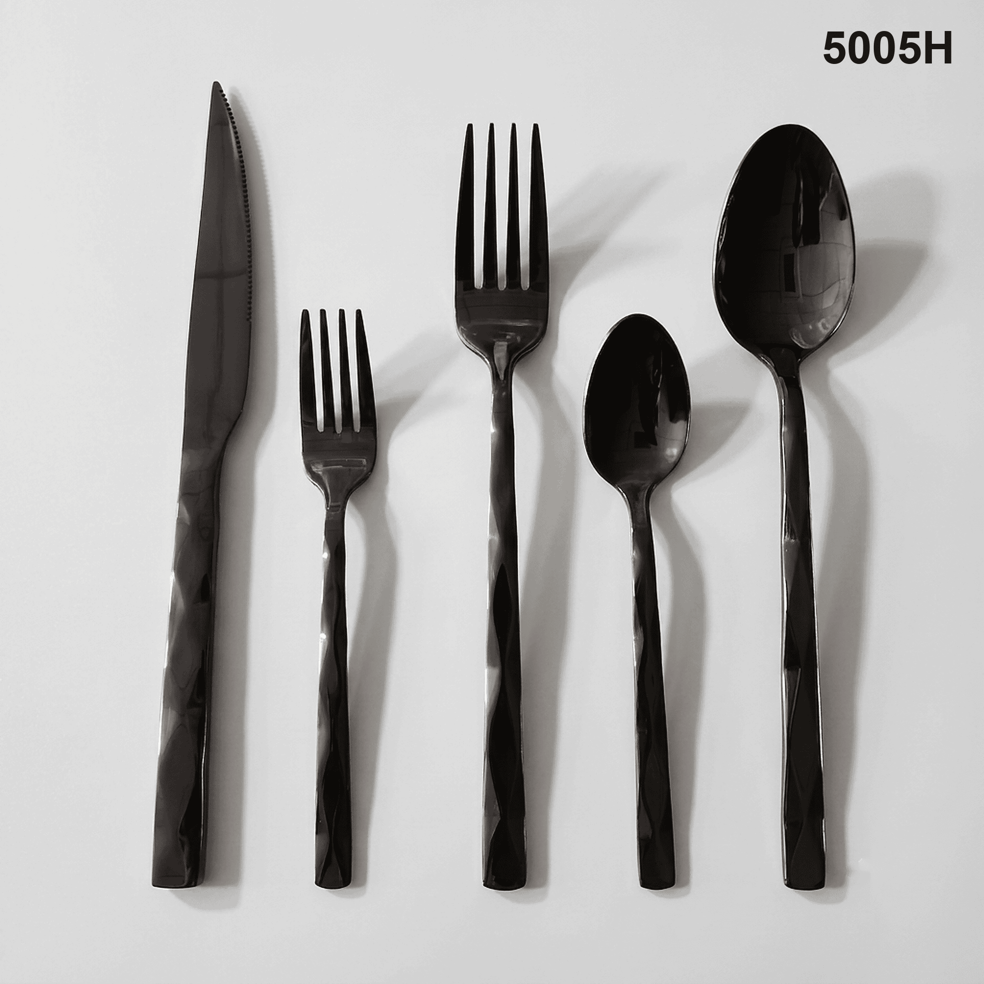 5005H sculpted, angular facets that create a twisted reflective effect along the handles 20-piece flatware set