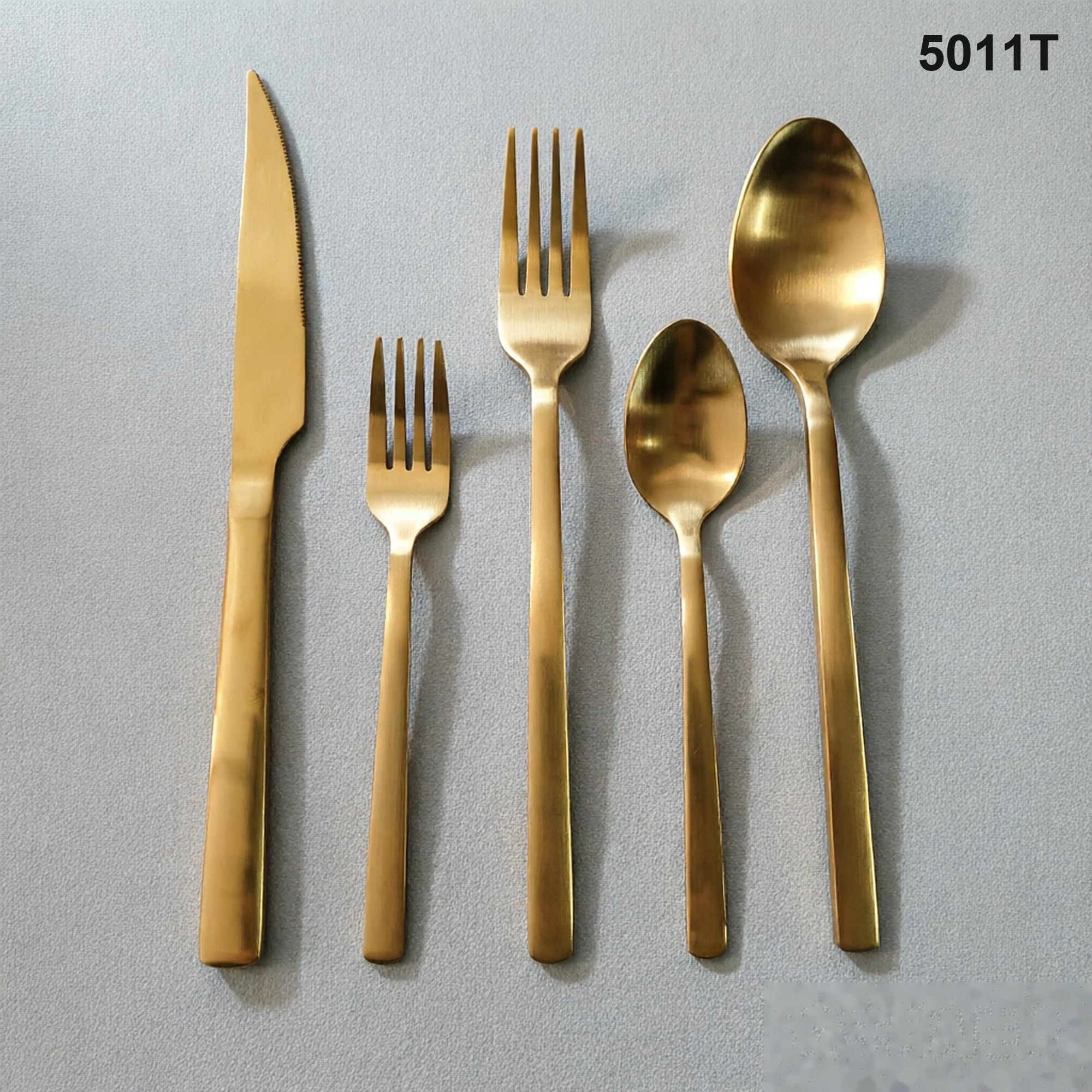 5011T clean straight-to-tapered handles with rounded ends and a restrained satin appearance 20-piece flatware set