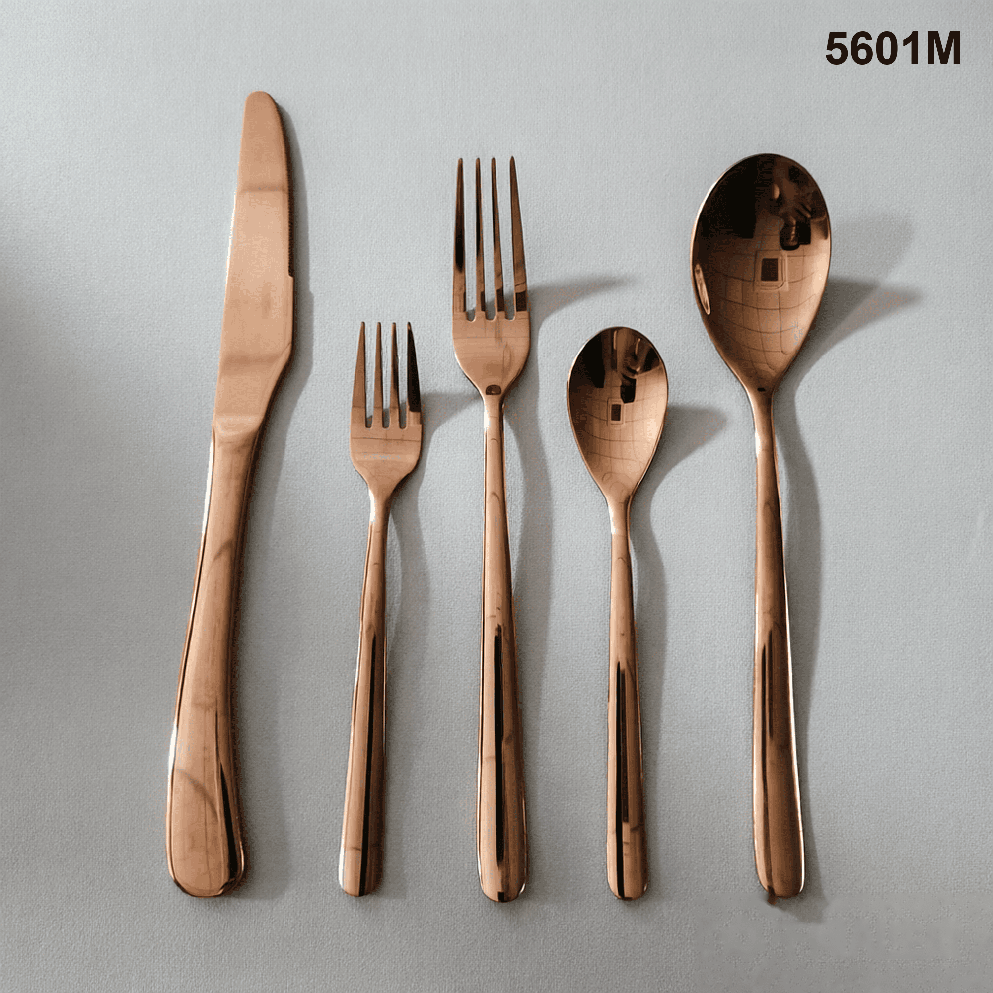 5601M simple smooth handles with a broad, softly rounded profile and rounded terminal 20-piece flatware set