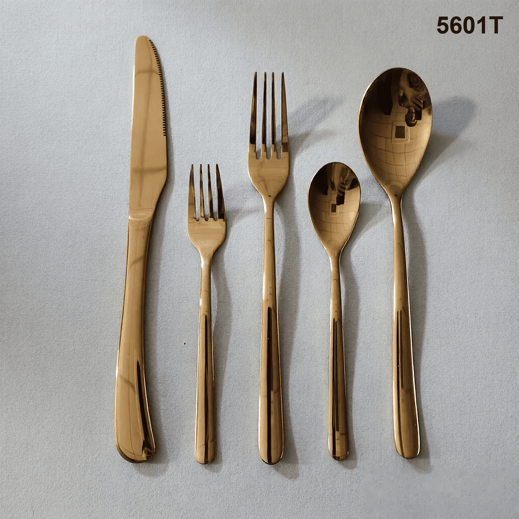 5601T simple smooth handles with a broad, softly rounded profile and rounded terminal 20-piece flatware set