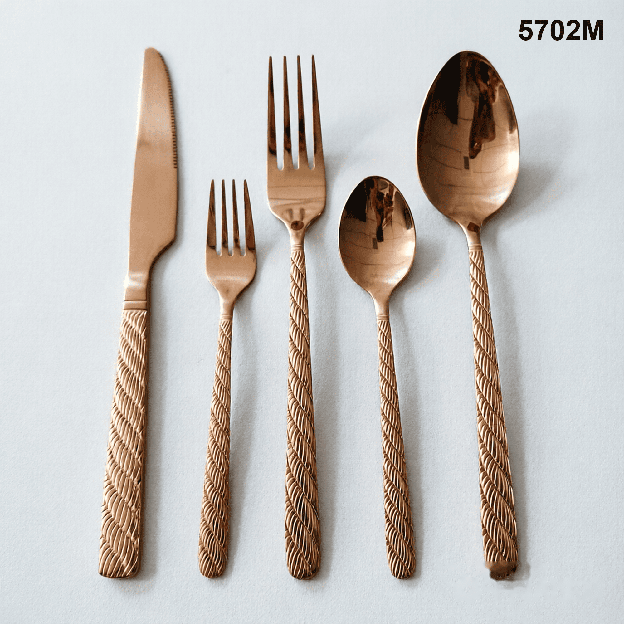 5702M repeating diagonal braided or rope-like texture running down the handles 20-piece flatware set