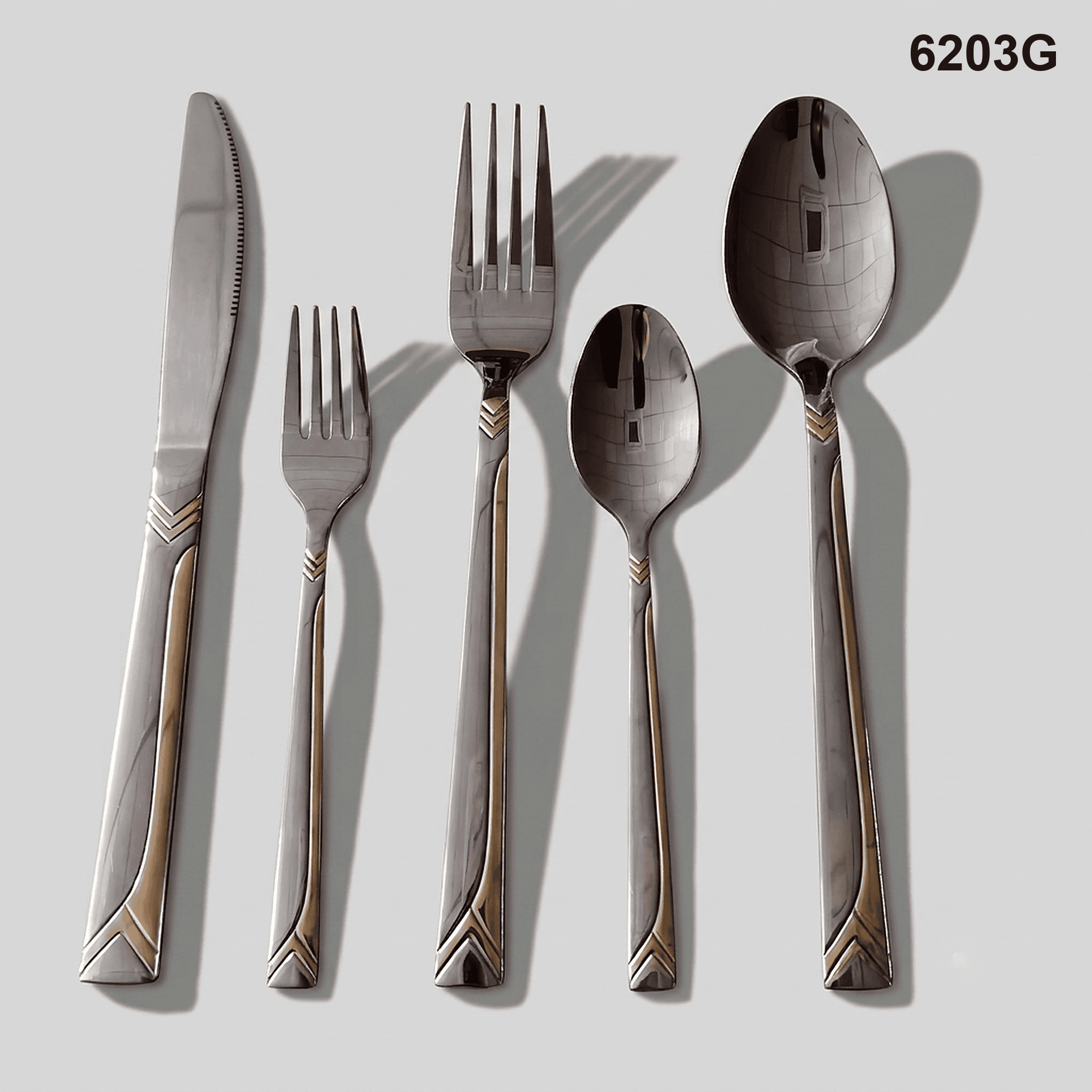 6203G a sweeping gold-toned inlay and stacked chevron accents on a smooth silver-tone handle 20-piece flatware set