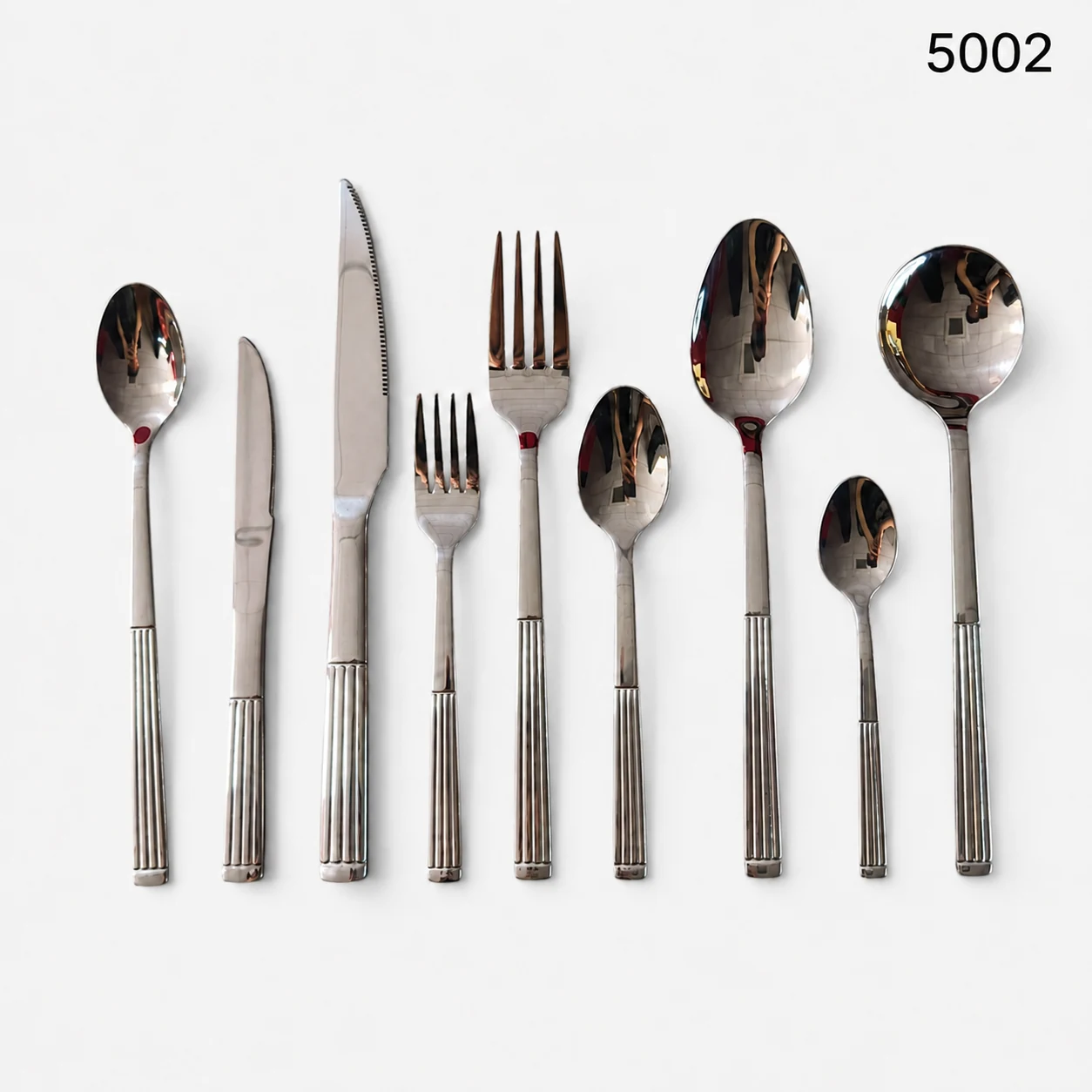 5002 silver flatware collection with fluted handles
