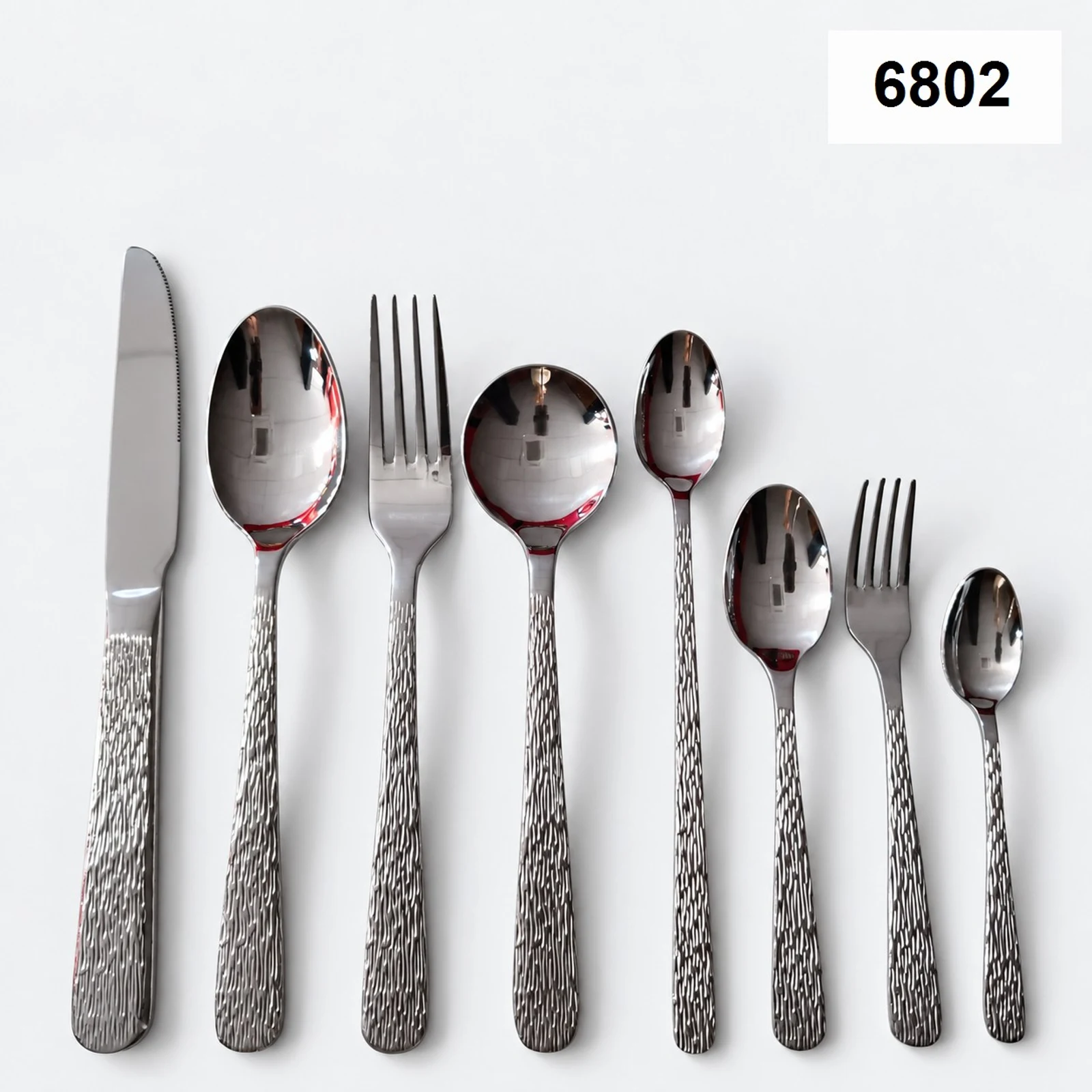 6802 18/0 cutlery with textured rounded handles