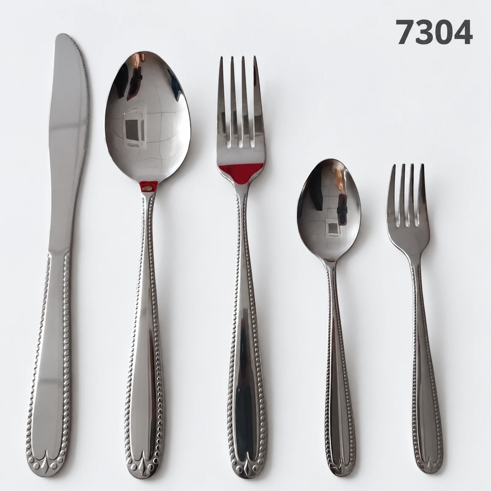 7304 18/0 cutlery with beaded-border handles