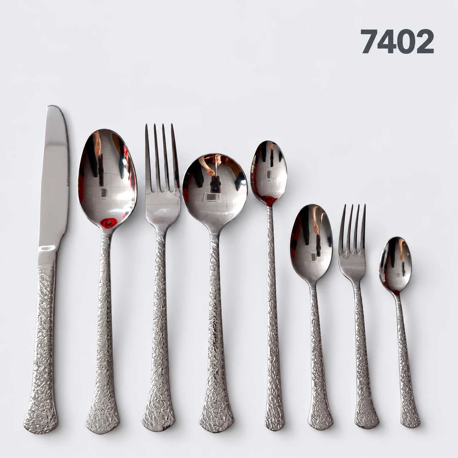 7402 18/0 cutlery with textured flared handles